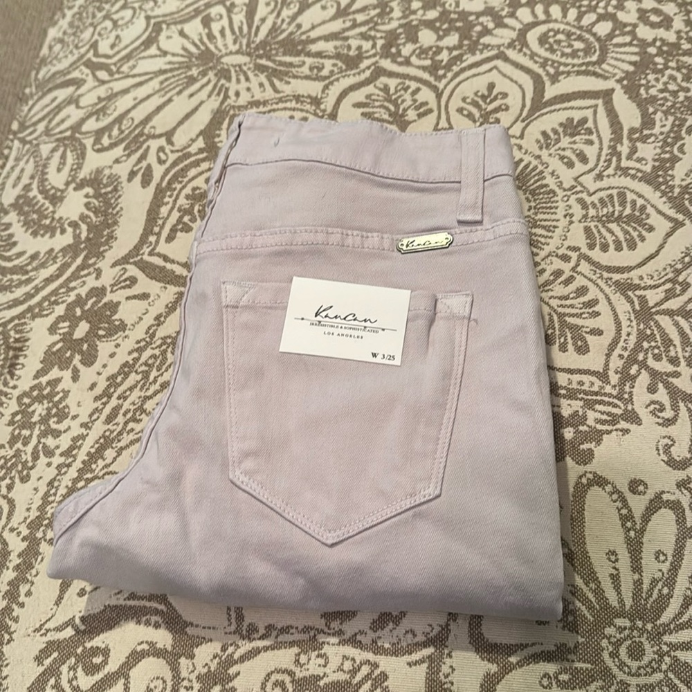 NWT KanCan skinny jeans in light pink/dove gray. Distressing at knees.